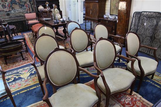 A set of sixteen Hepplewhite design mahogany elbow chairs, W.2ft 3in. H.3ft 2in.